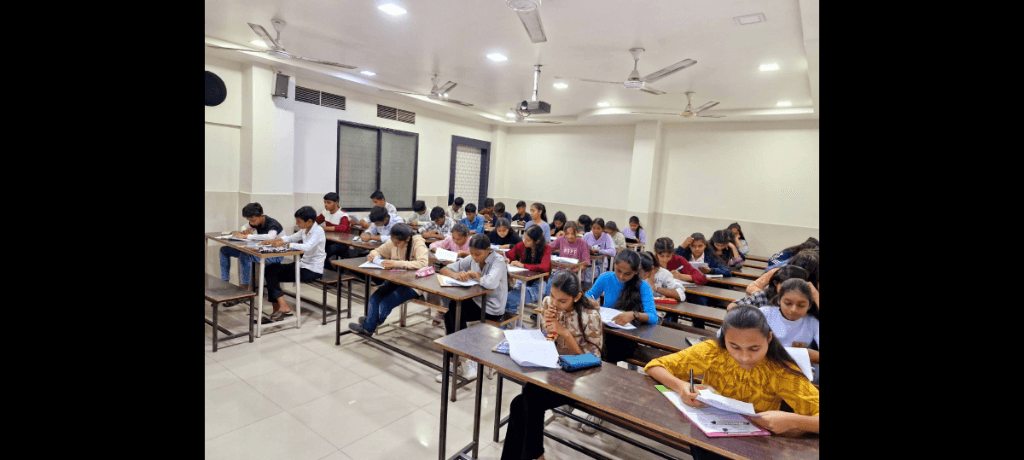 Students studying in a coaching classroom at New Career Point